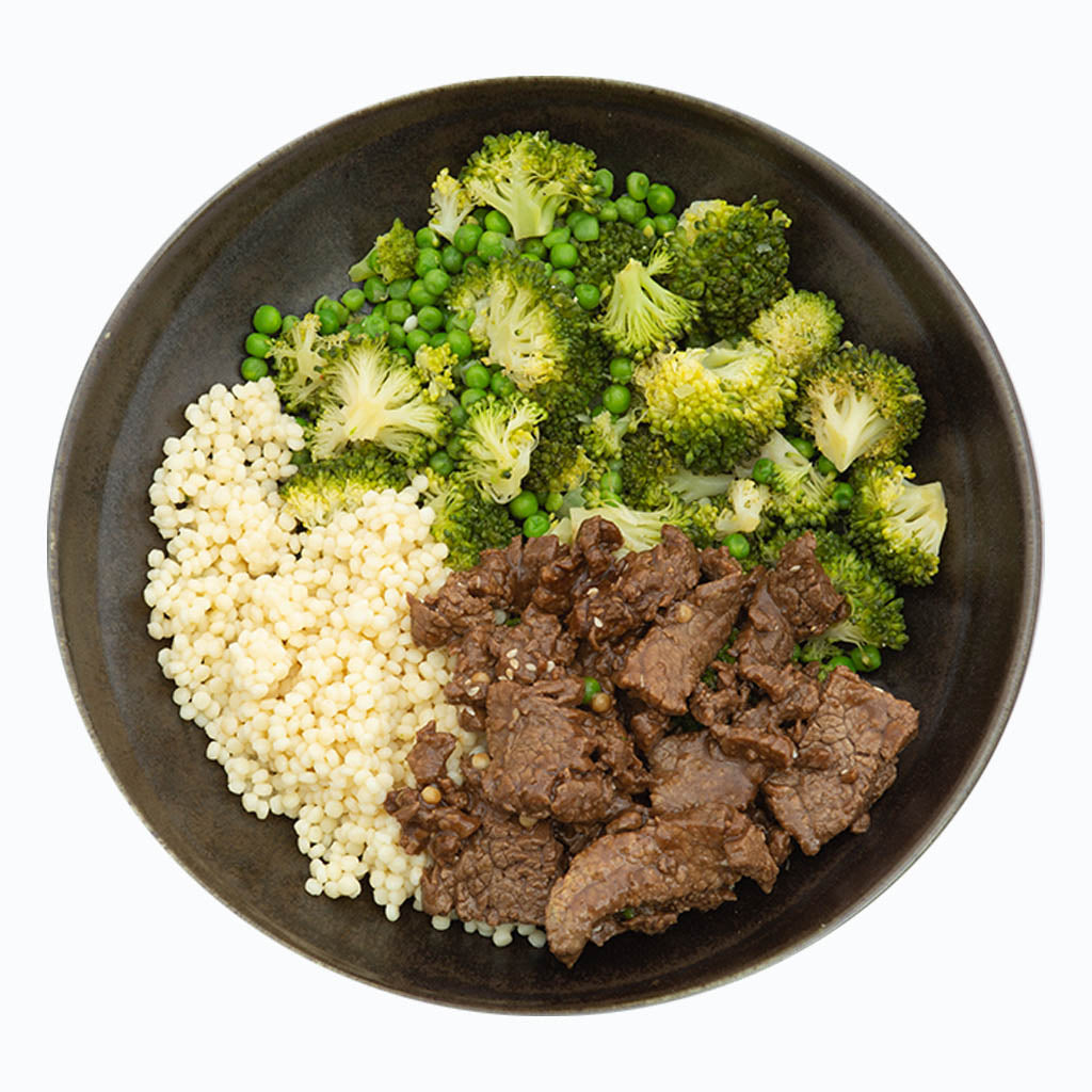 Beef teriyaki met parelcouscous, broccoli en erwtjes