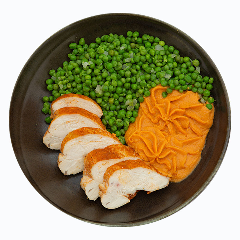 Kip met zoete aardappelpuree en erwtjes