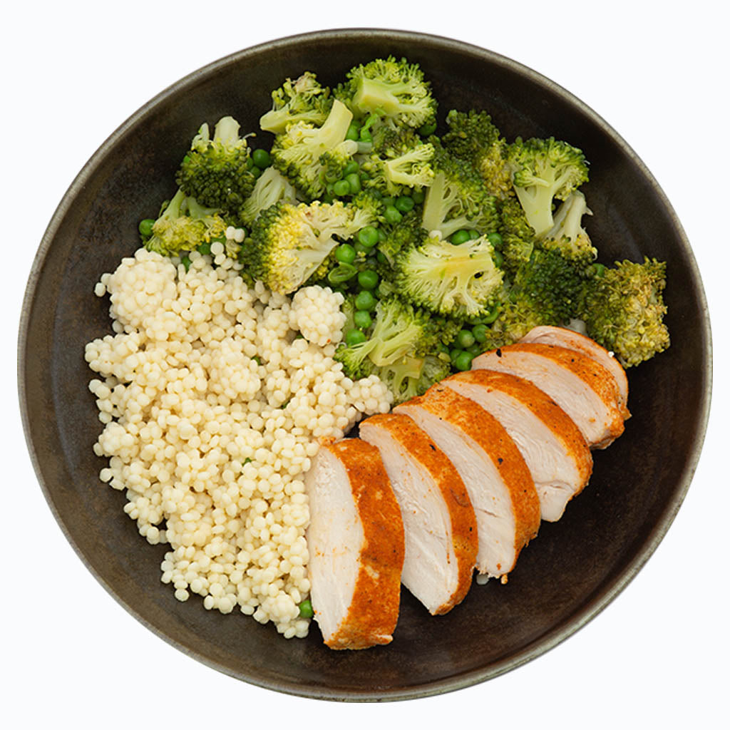 Kip met parelcouscous broccoli en erwtjes